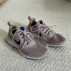 Nike size 5Y light plum colored knit running shoes in like new condition.